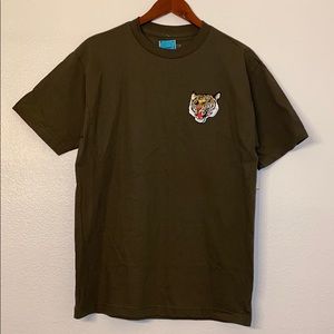 Green shirt with Tiger emblem. Brand New